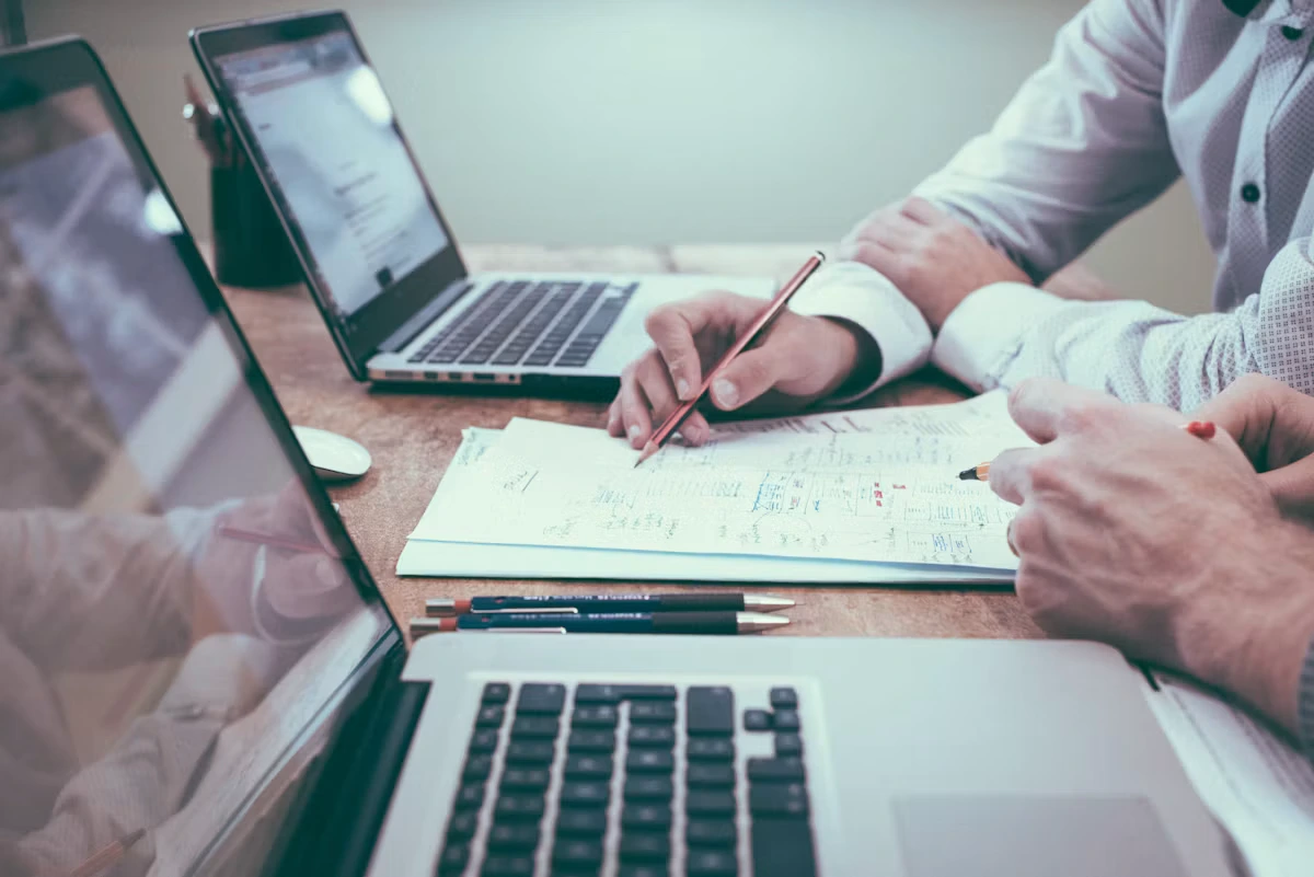 Investment team reviewing portfolio performance